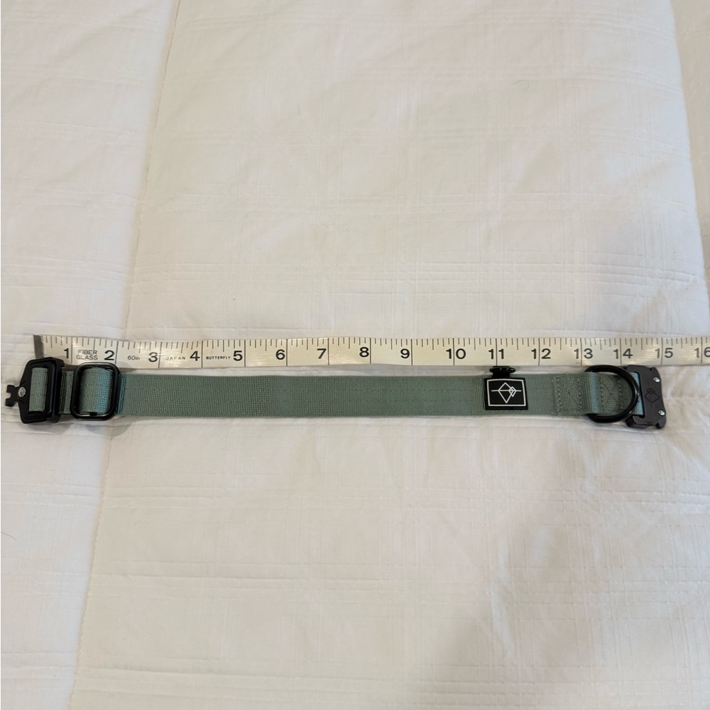 Made to Roam adjustable dog collar. Sage green with black hardware and accents.